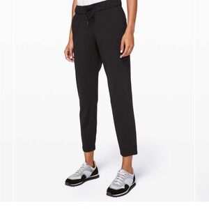 Lululemon Athletica Black On the Fly 7/8 pant, drawstring elastic waist